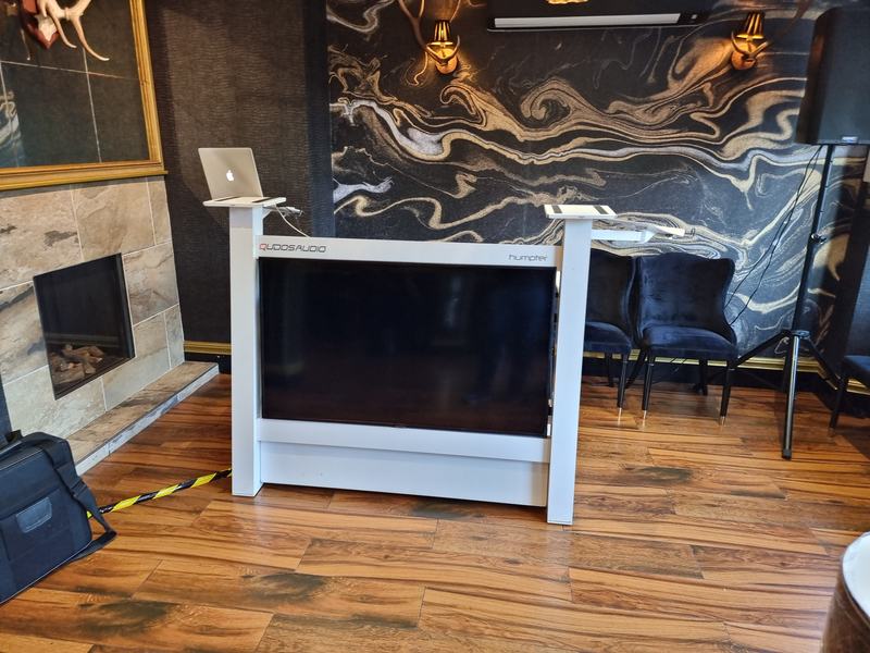 White Qudos Audio DJ booth in a luxury venue